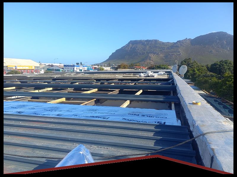 Asbestos removal by Rome Roofing