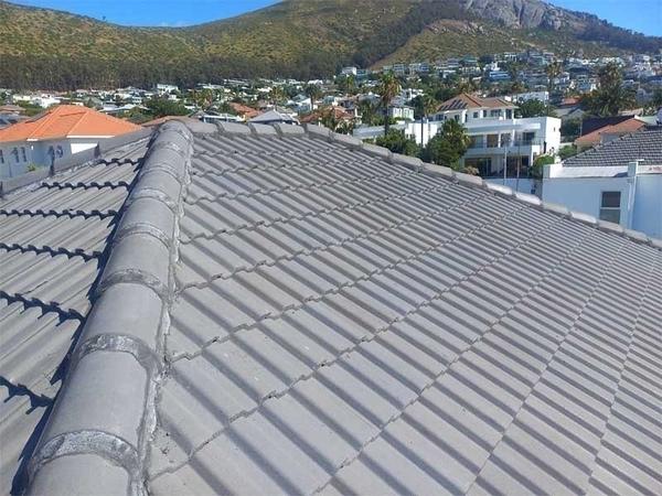 Newly tiled roof against the mountains