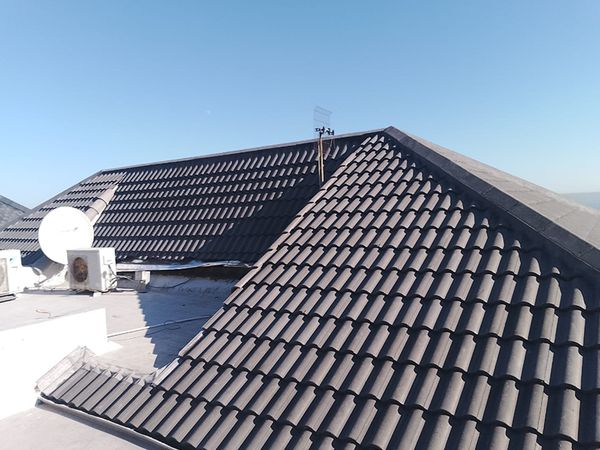 Tiled roof ridges and valleys on a residential property