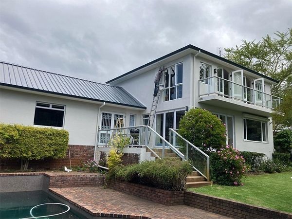 Freshly painted house exterior and driveway