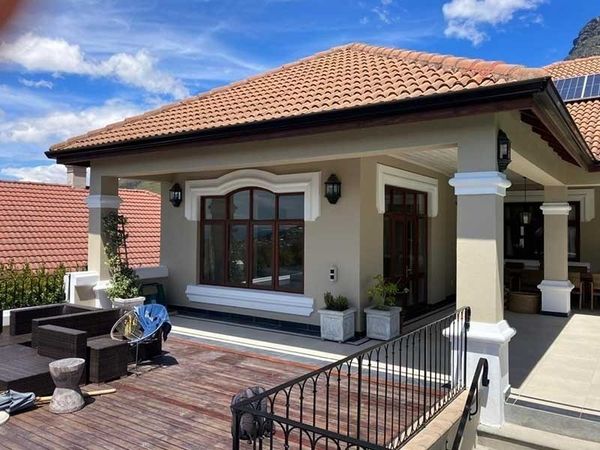 Completed exterior painting on a family home