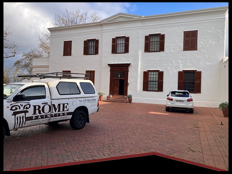 Freshly painted double-storey home exterior by Rome Roofing